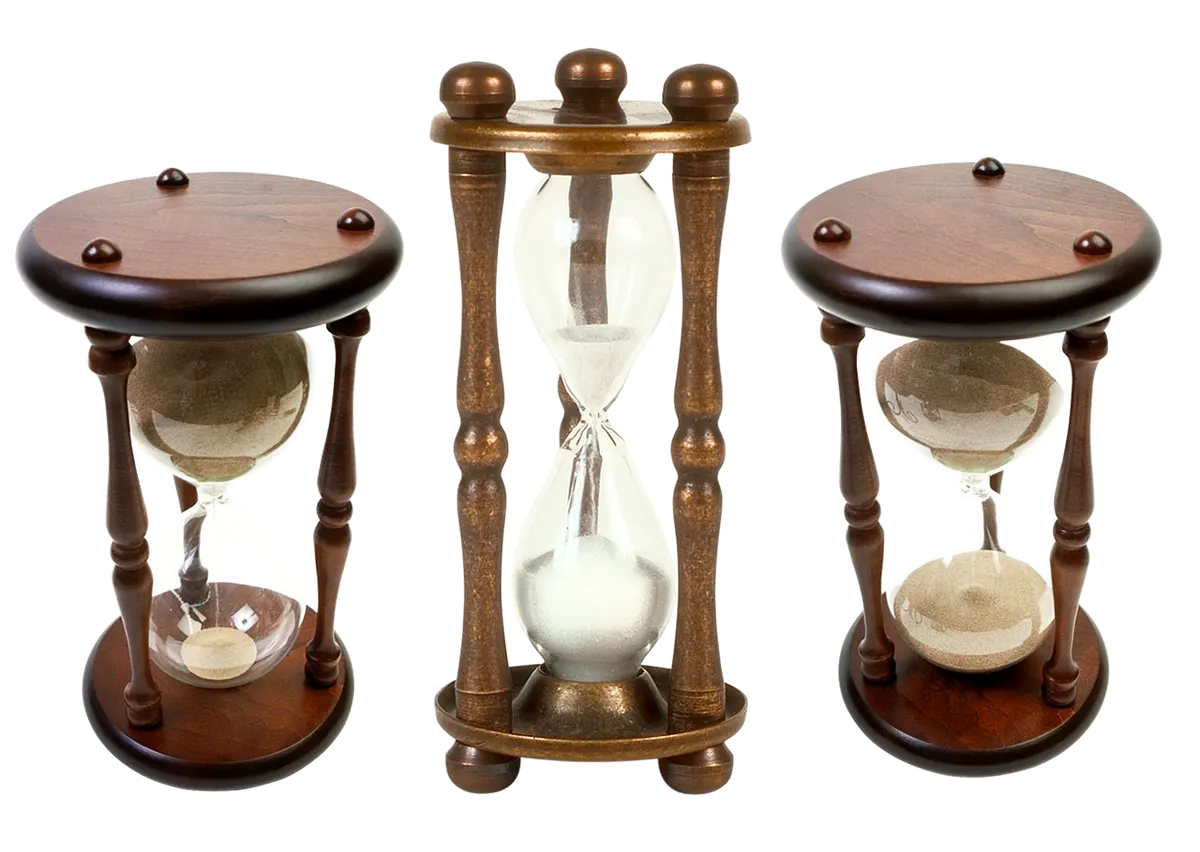Three wooden hourglasses with their sand at different levels, like DNS caches around the world each counting down to a different expiry time.